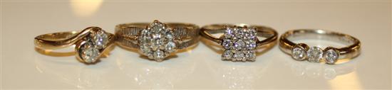 3 x 18ct gold and diamond rings and a 9ct gold and diamond crossover ring.